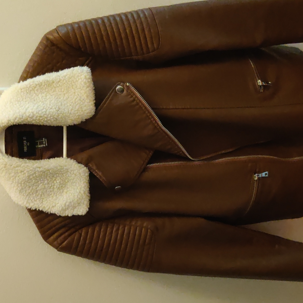 Lether jacket. large size.brown color